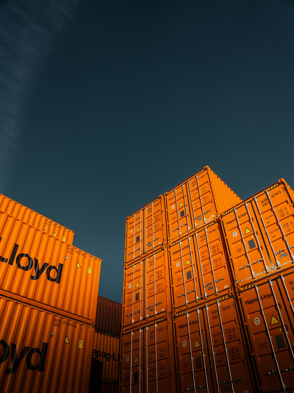 brown cardboard boxes under blue sky during daytime