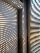 white window blinds on window