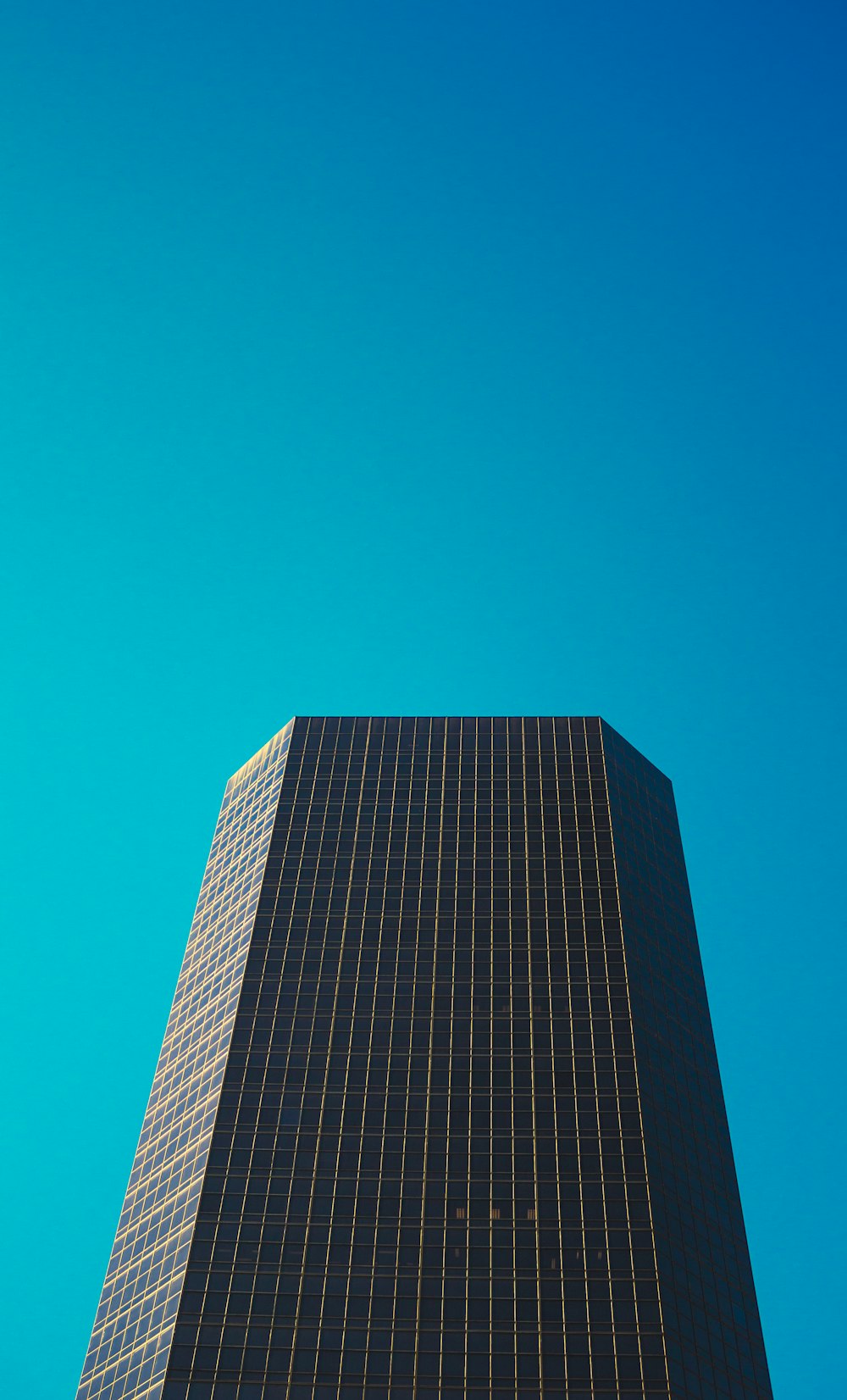 gray concrete building under blue sky during daytime