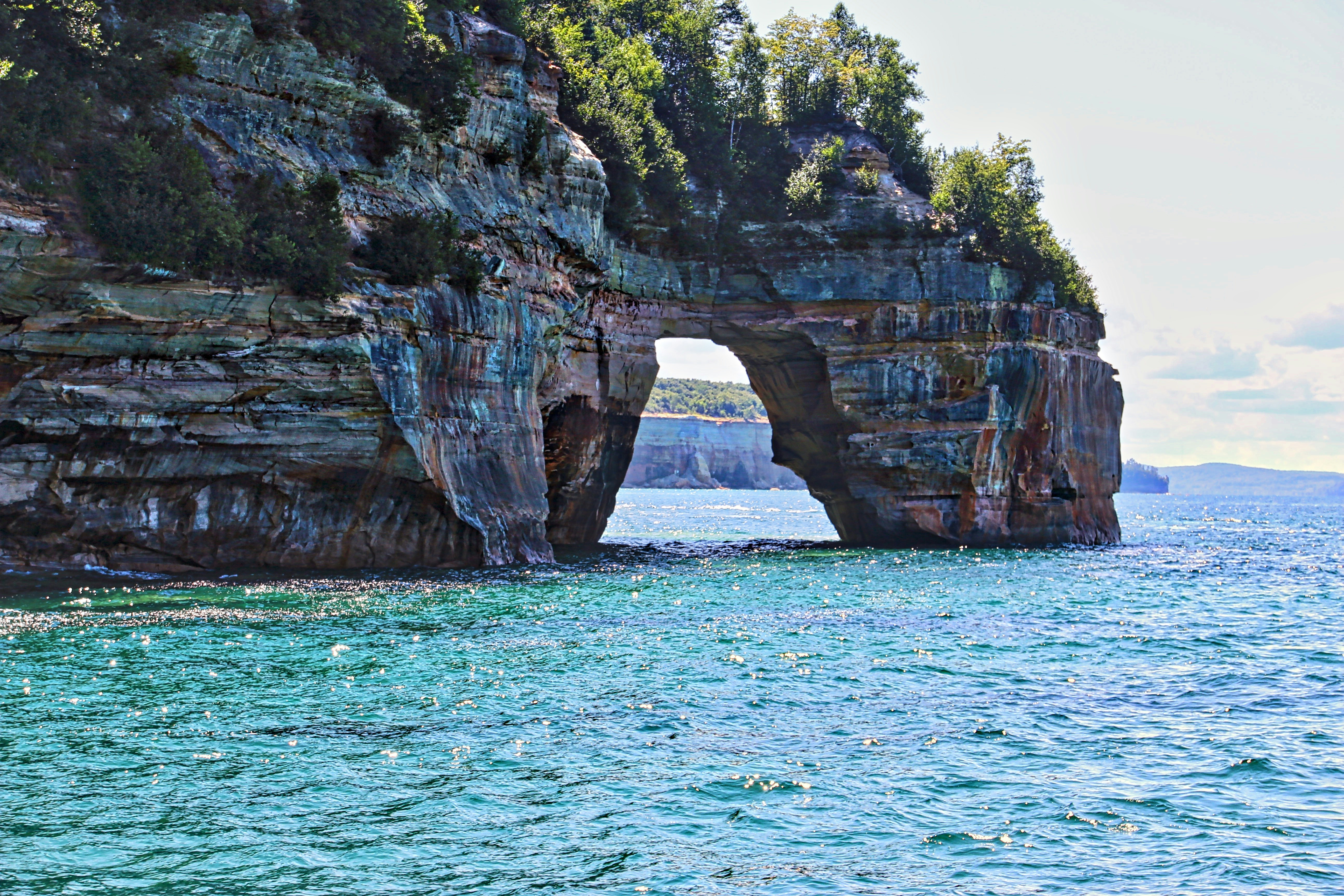 Brown Rock Formation Near Green Trees During Daytime Photo Free Pictured Rocks Image On Unsplash