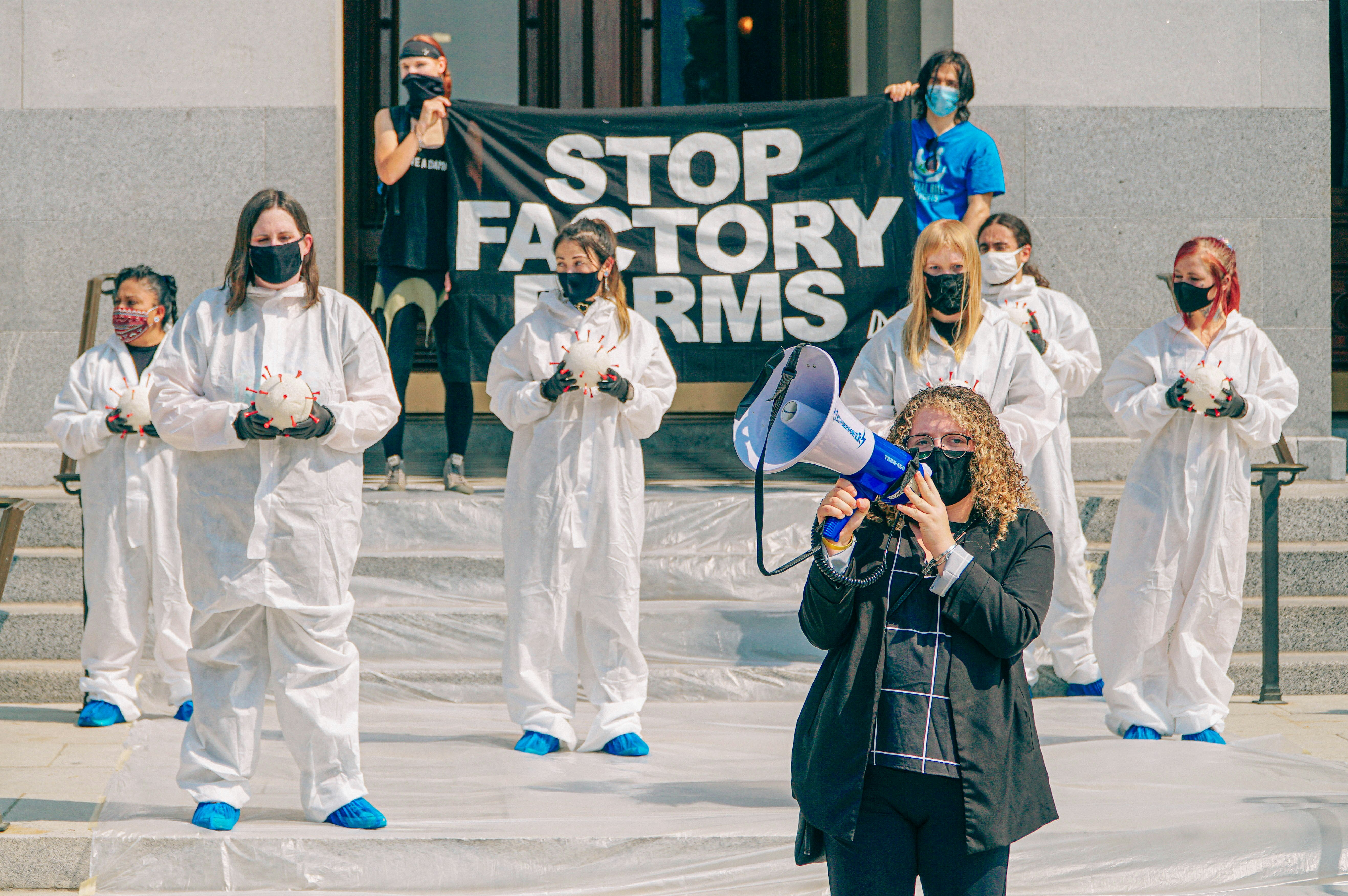 Animal Rights activists from Direct Action Everywhere protest in Sacramento to stop factory farms the negative effects on the climate crisis, is the contribution to pandemics, like covid-19 and animal cruelty.