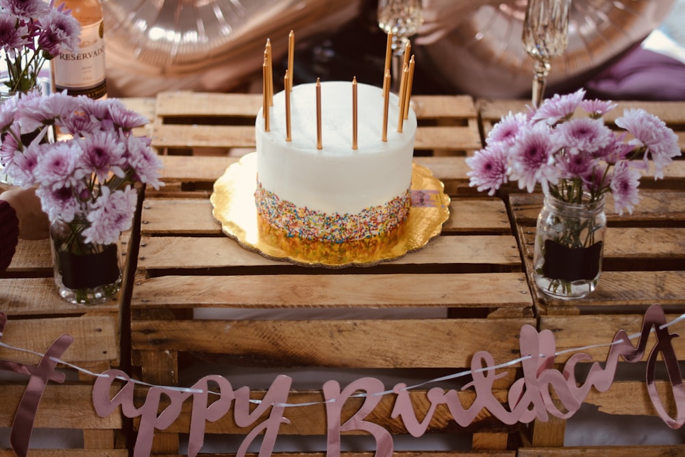 yellow and white cake on brown wooden table