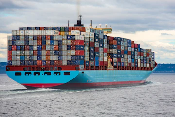Container ship at port loaded with shipping containers
