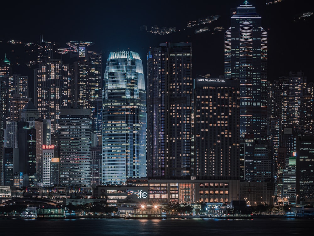 city skyline during night time