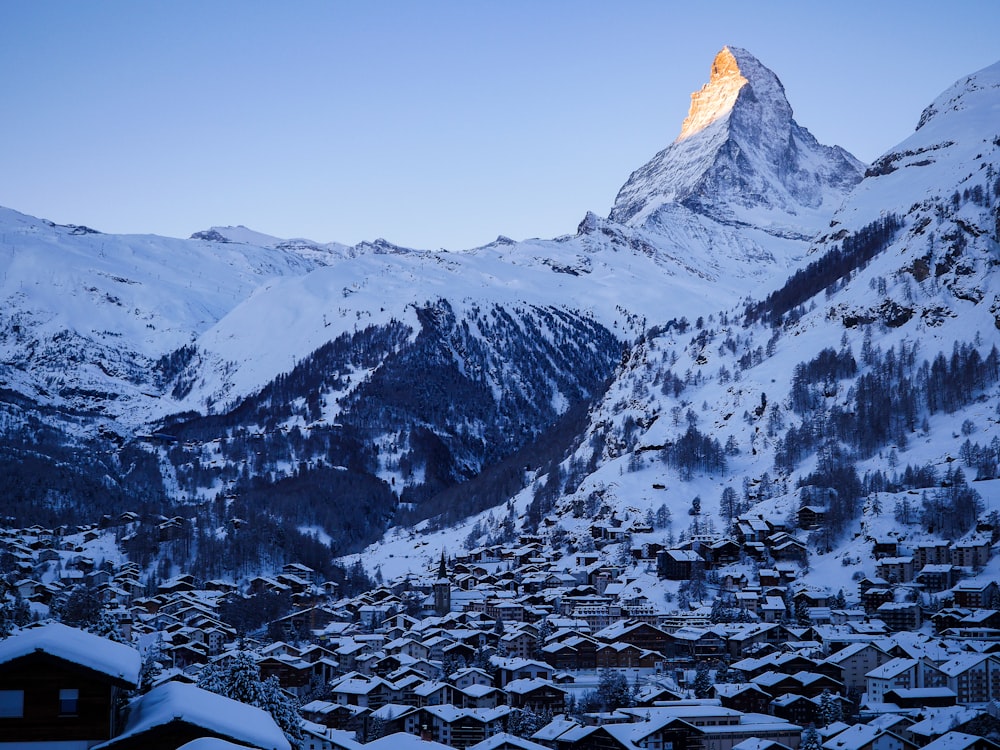 snow covered mountain during daytime