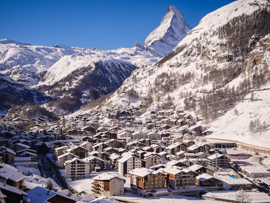 Snowy chalet rooftops of Zermatt village