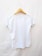 A plain white t-shirt is displayed on a wooden hanger against a light background. The t-shirt is short-sleeved and appears to be made of a lightweight material.