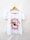 A white t-shirt hanging on a wooden hanger features a graphic design. The center showcases an eagle's head within a star shape, surrounded by flames and text that reads 'Rock and Roll' and 'Made in Heaven.'
