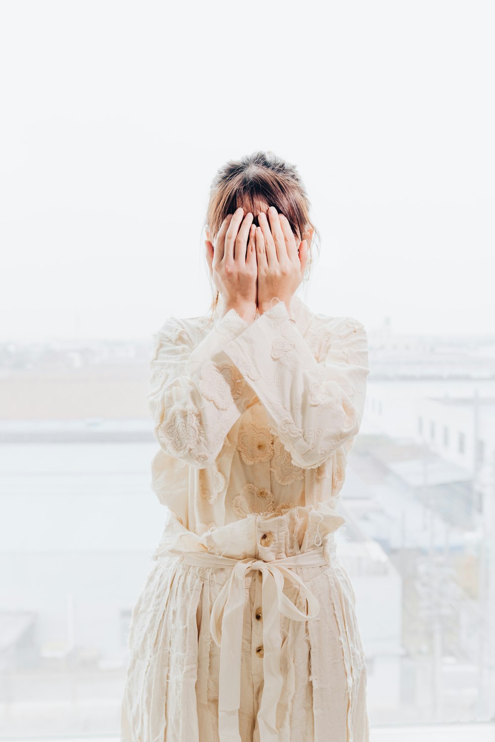 woman in white long sleeve dress