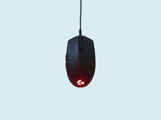 black and red corded computer mouse
