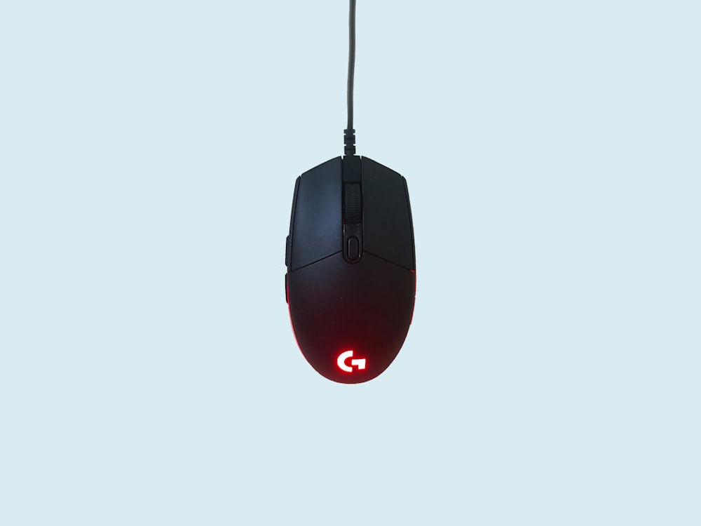 black and red corded computer mouse