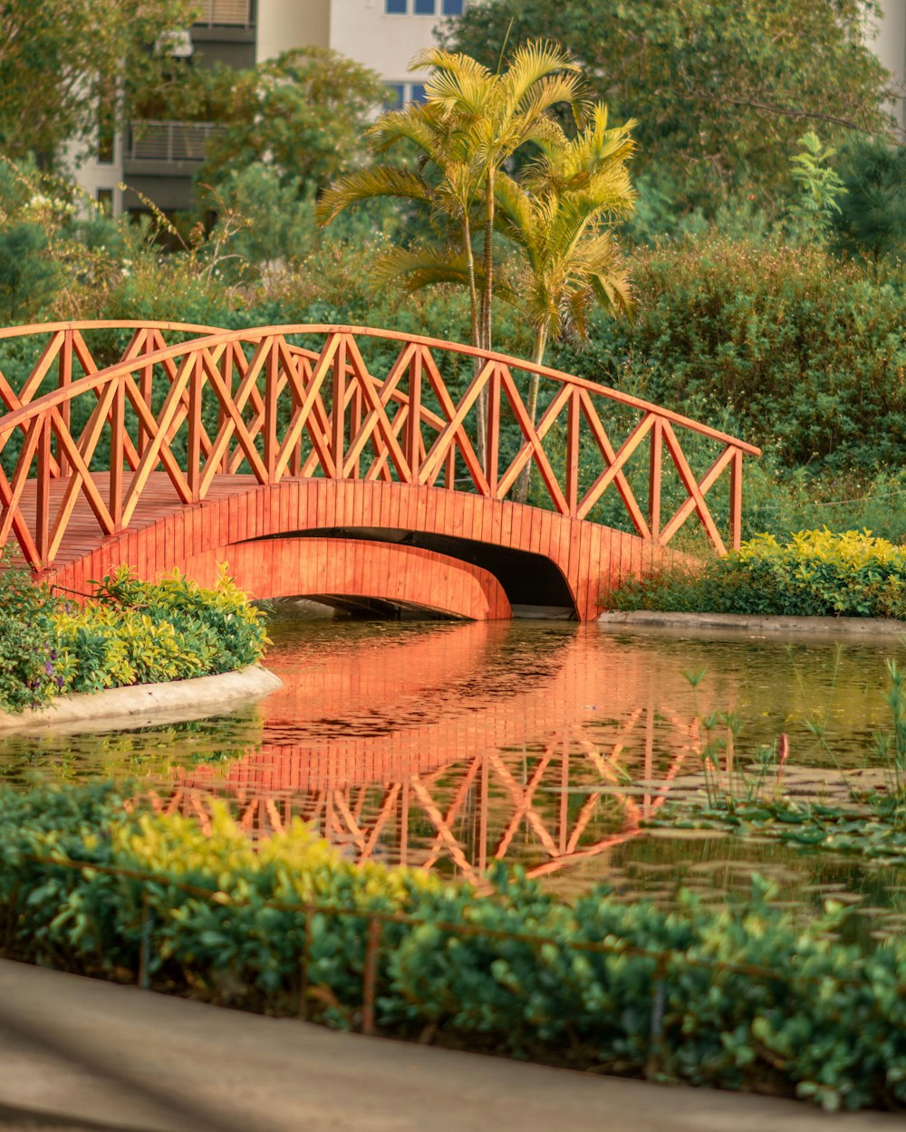 red metal bridge over river