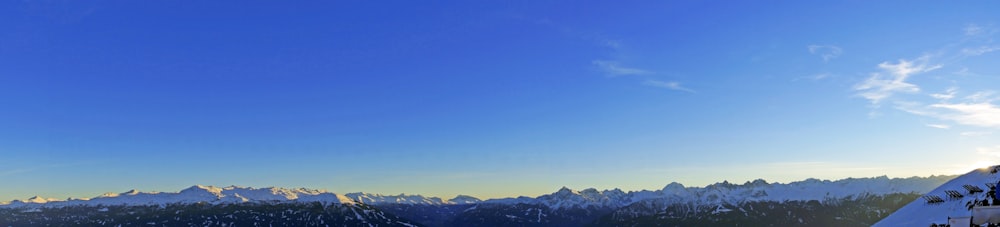 blue sky over mountains during daytime