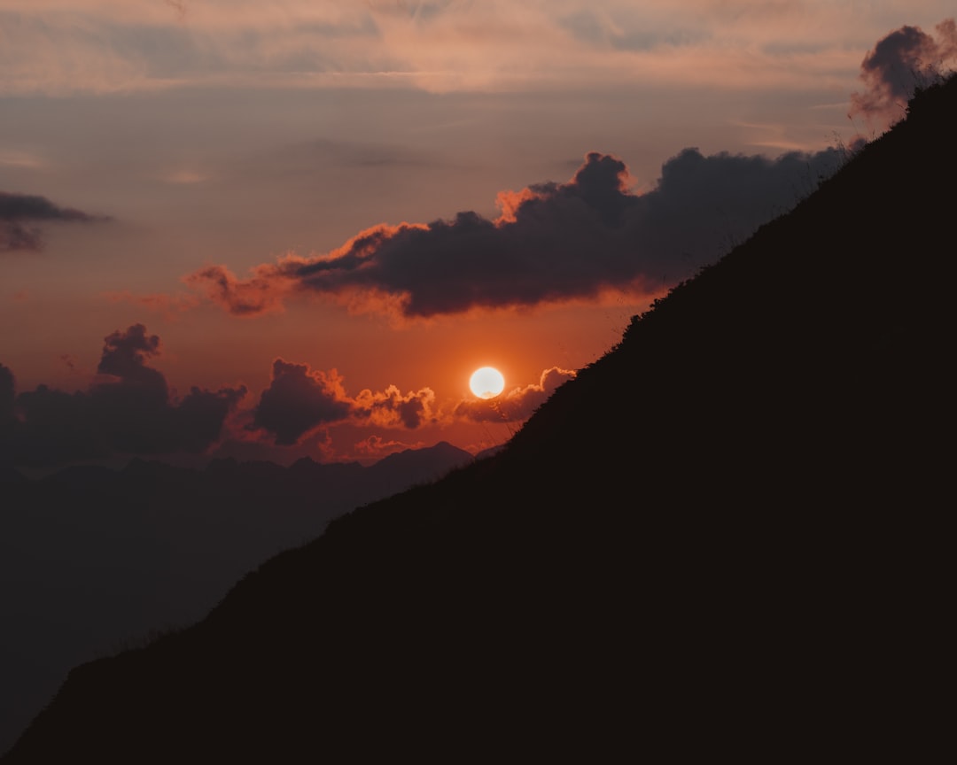 silhouette of mountain during sunset