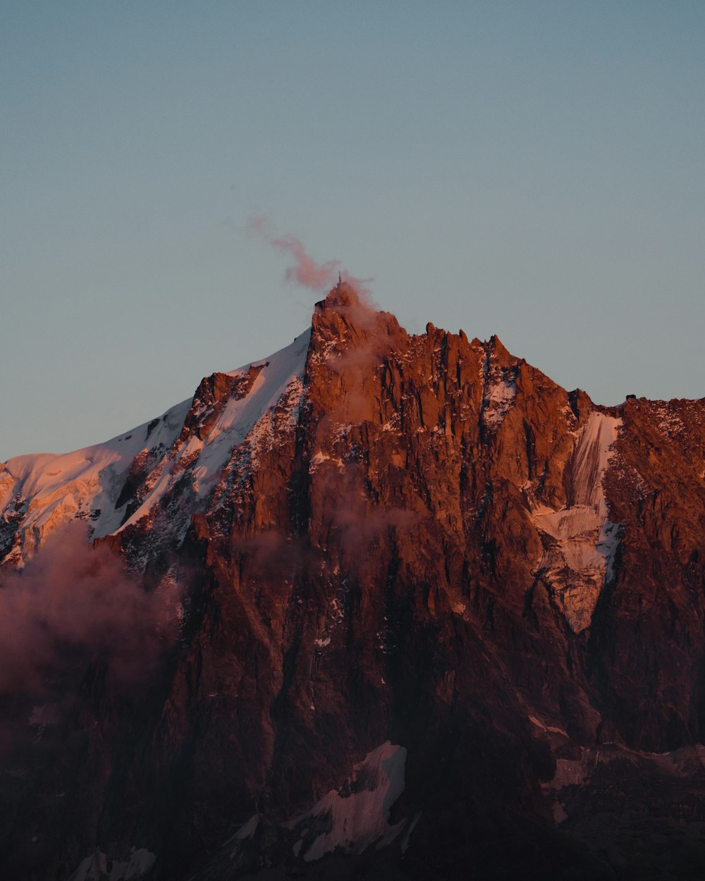 brown and white mountain under white sky during daytime