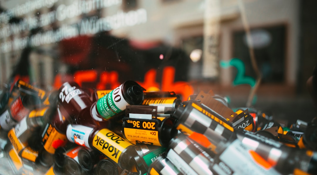 assorted bottles on glass shelf