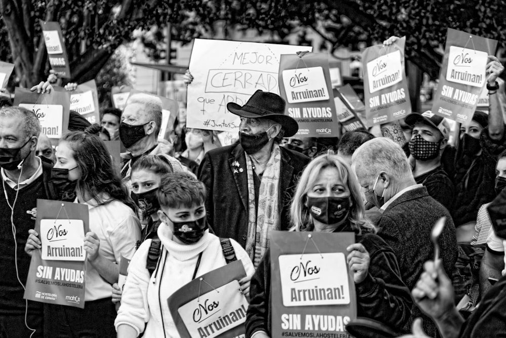 grayscale photo of man and woman smiling