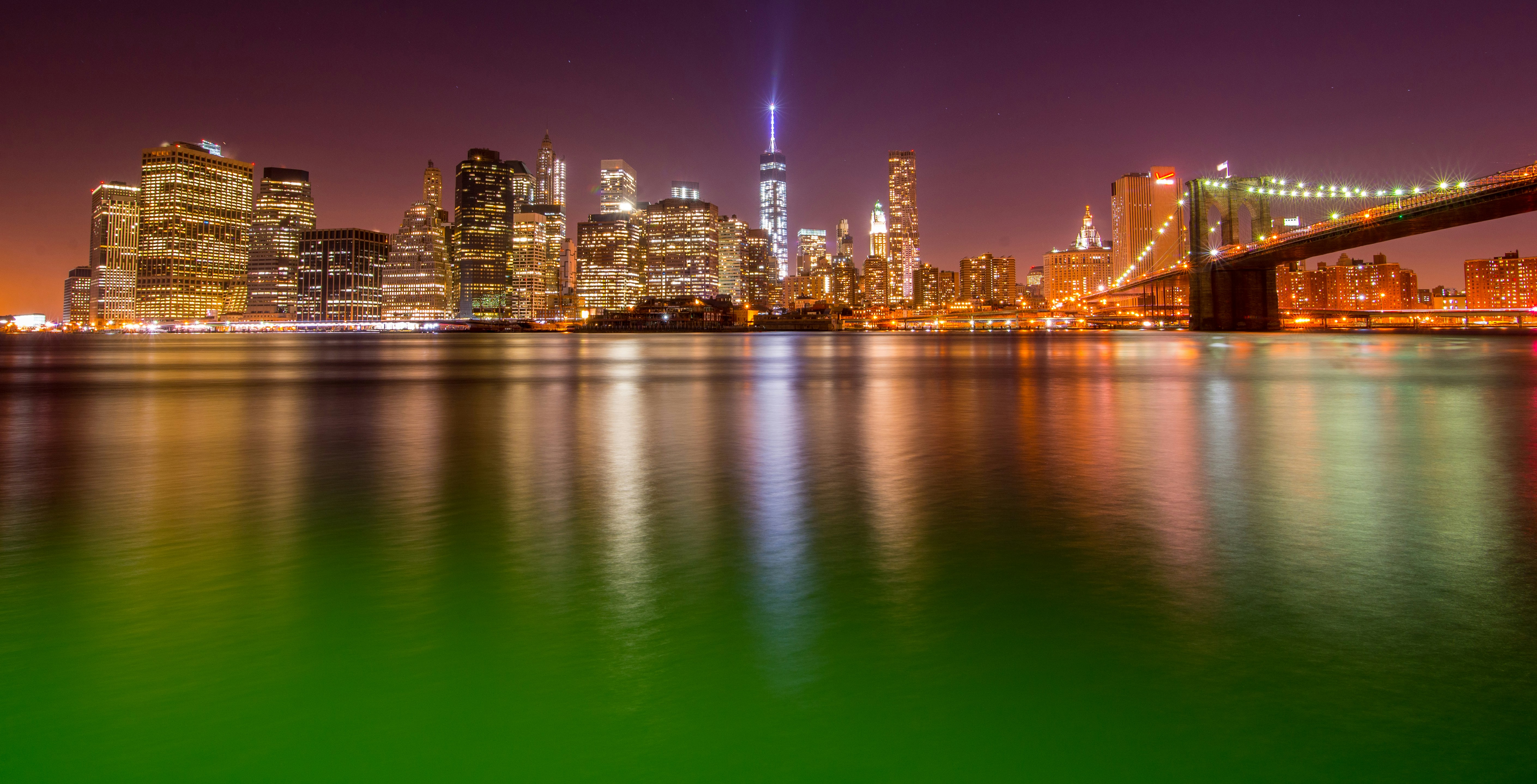 city skyline during night time