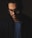 man in black jacket wearing black framed eyeglasses