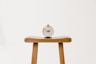 brown wooden table clock at 10 10