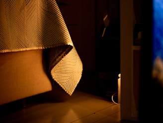 brown and white striped textile