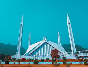 white and brown concrete building under blue sky during daytime
