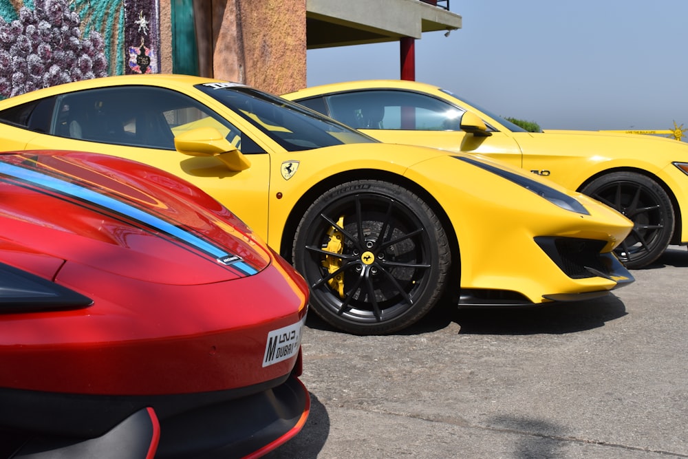 yellow ferrari 458 italia parked on gray concrete pavement during daytime