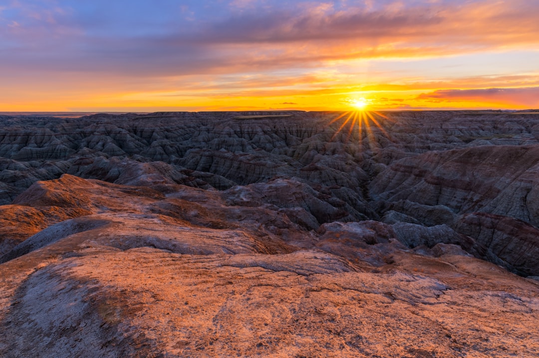 brown rocky mountain during sunset