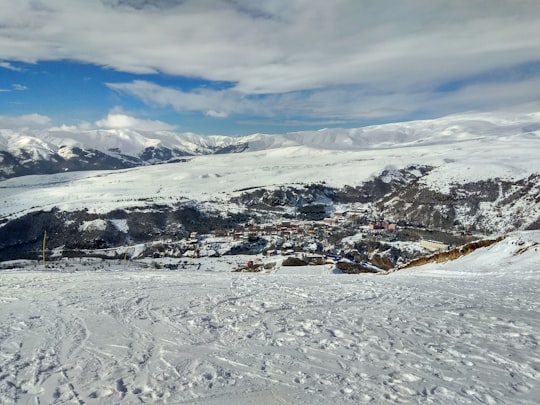 snow covered mountain under blue sky during daytime in Jermuk Armenia