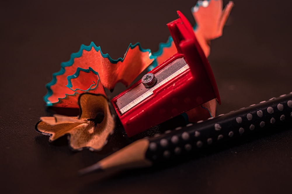 red and silver pencil sharpener