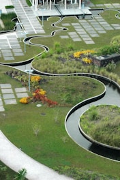 green grass and white concrete stairs