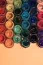 red green and blue round plastic containers