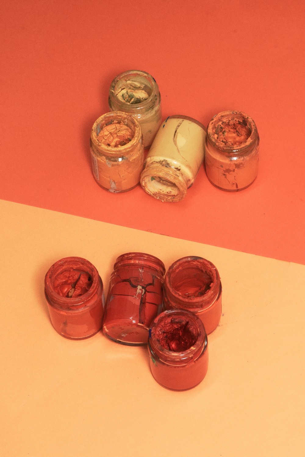 clear glass jars on pink table