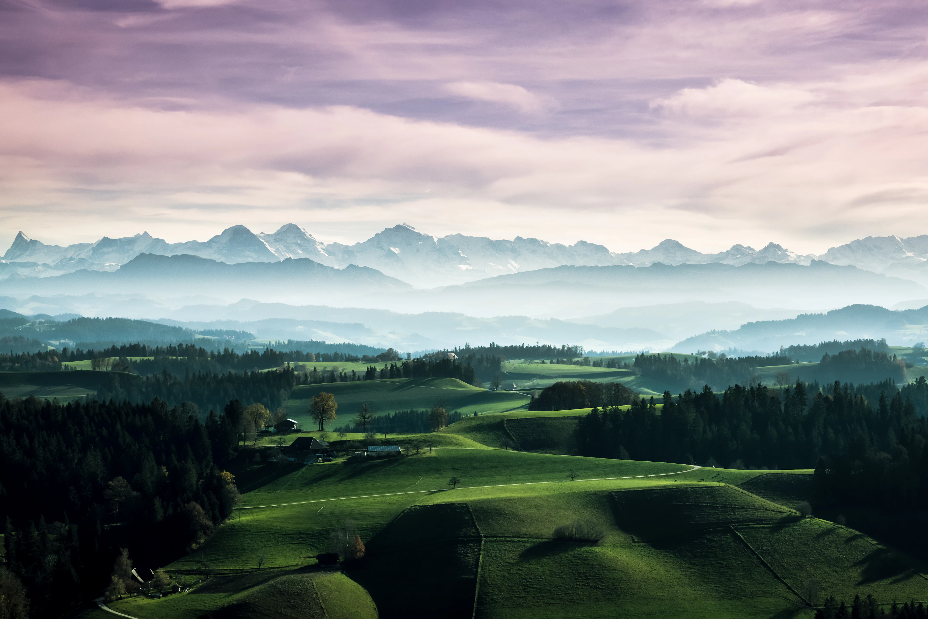The rolling green hills and trees of the Emmental cheese country near Bern