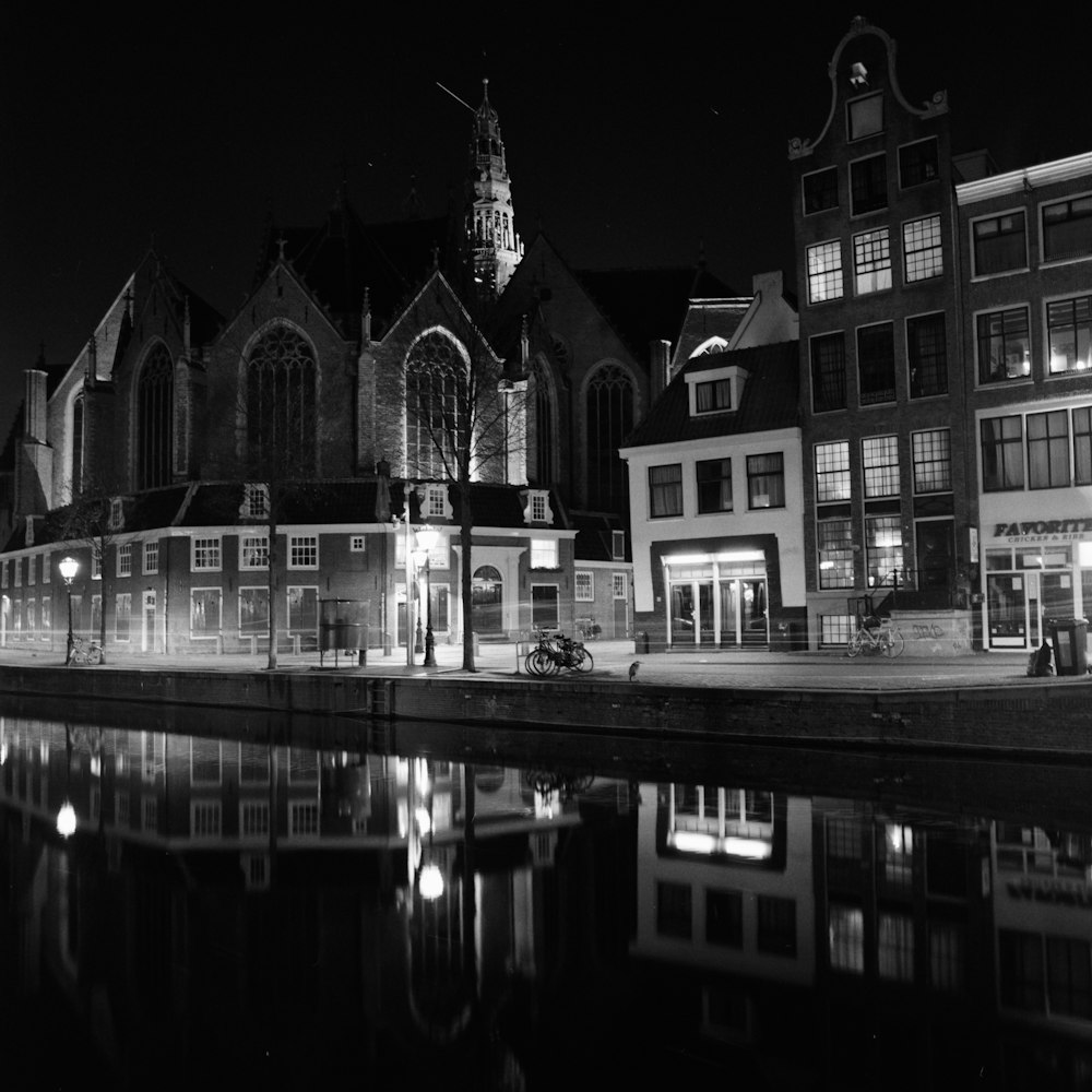 grayscale photo of building during night time