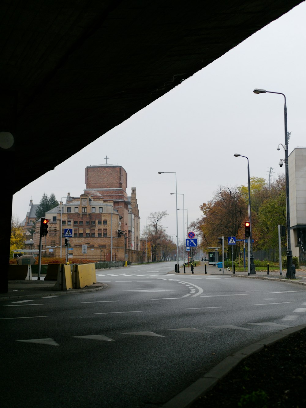 gray concrete road with no cars during daytime