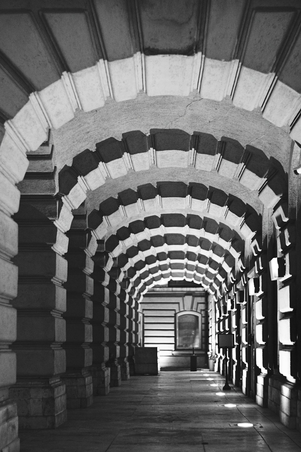 gray concrete tunnel during daytime