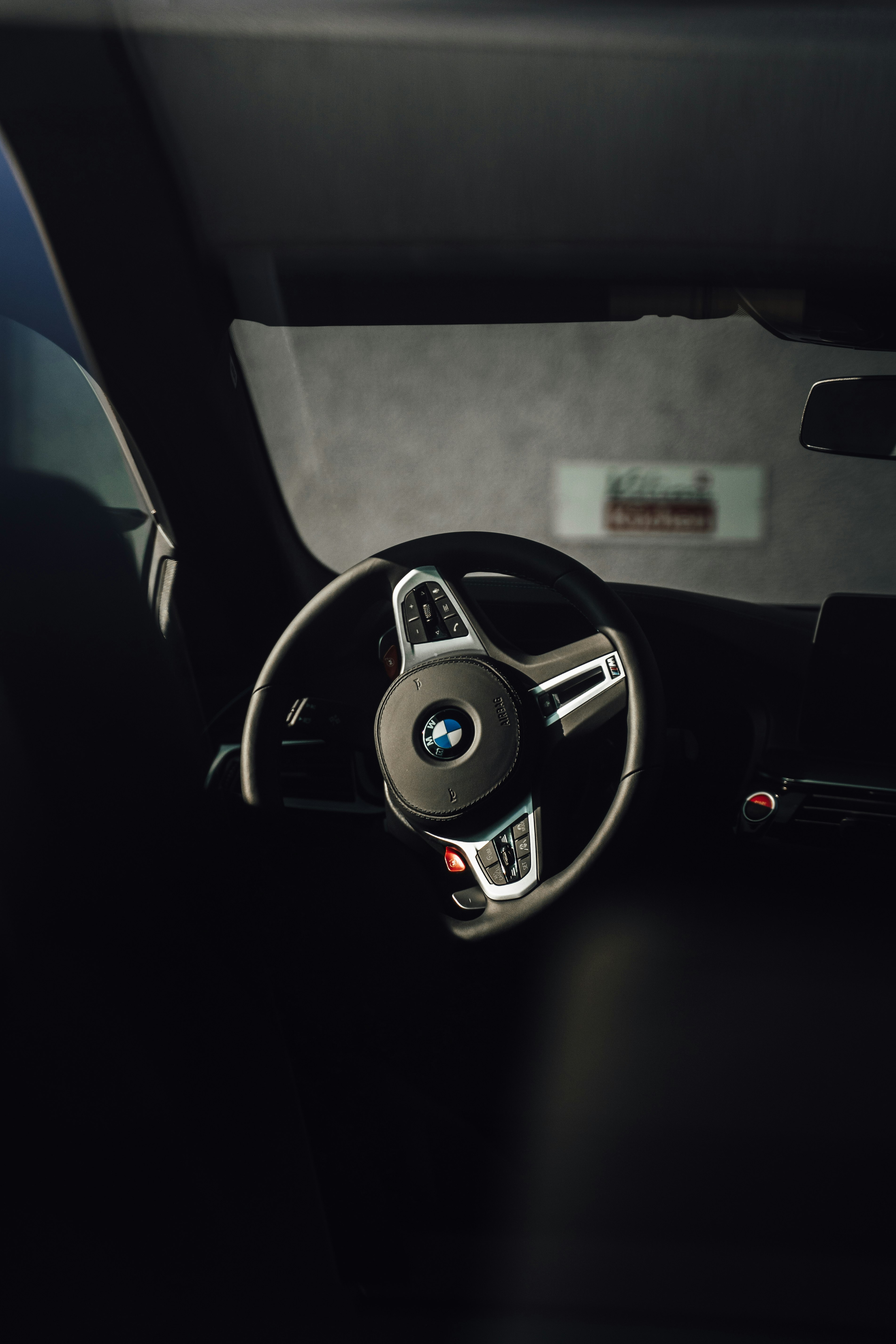 black and silver bmw steering wheel