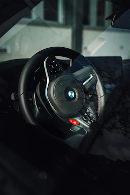 black and silver steering wheel