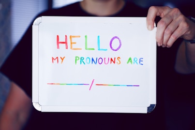 person holding white printer paper