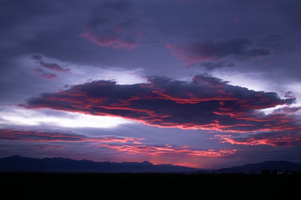 orange and black clouds during sunset