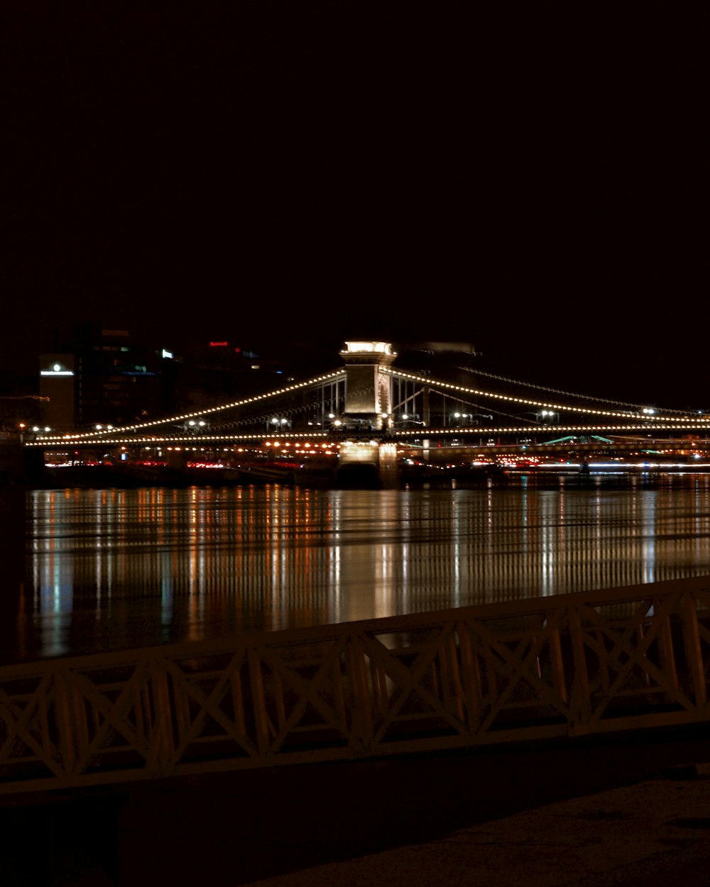 lighted bridge during night time