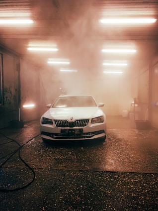 white bmw car on road during daytime