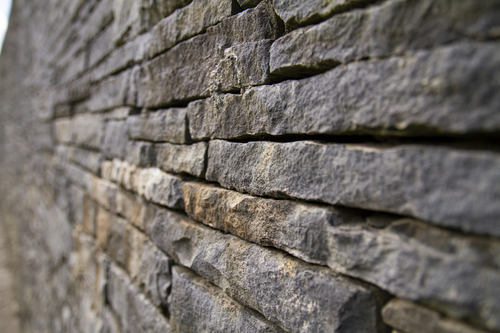 gray and black stone wall
