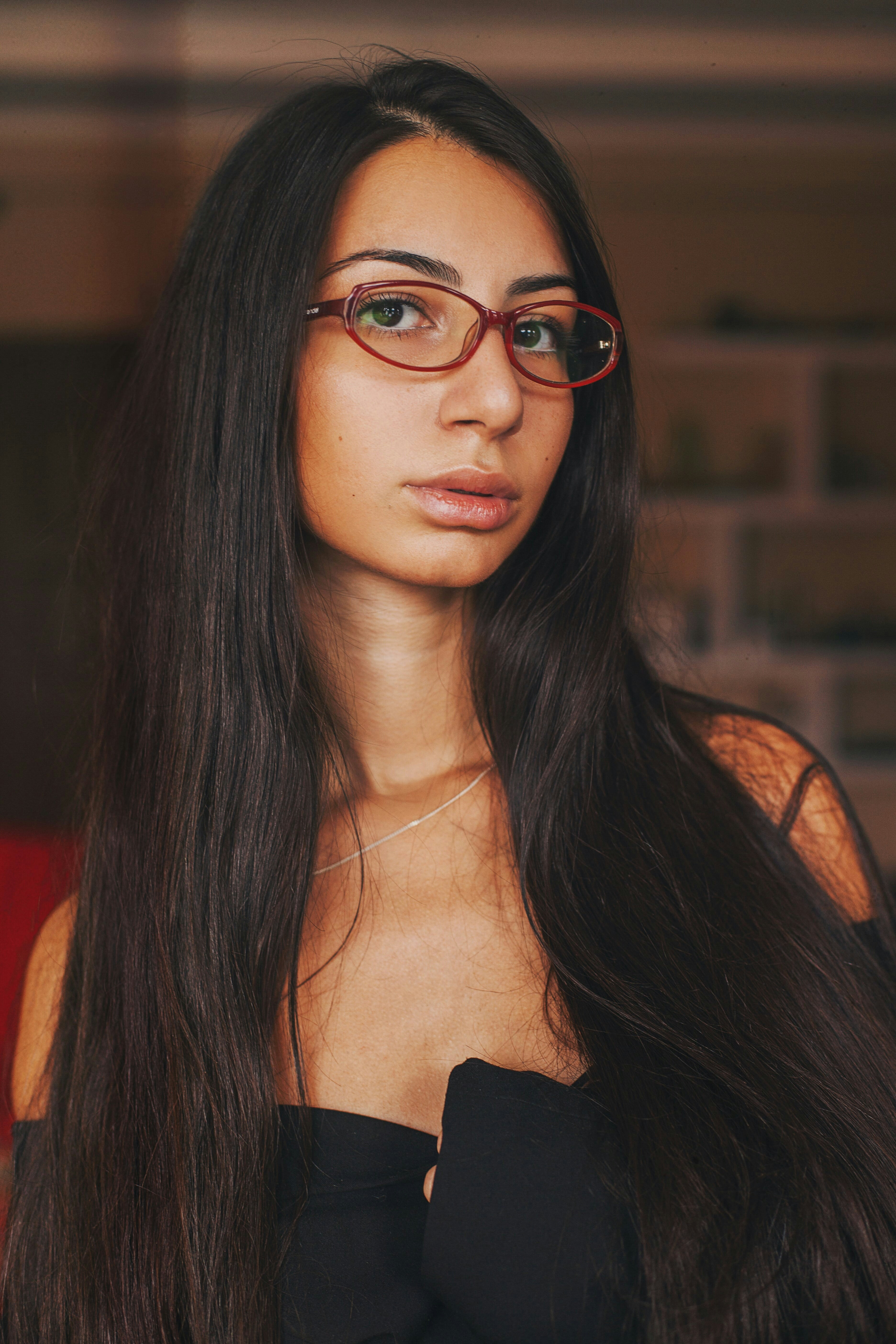 woman in black framed eyeglasses