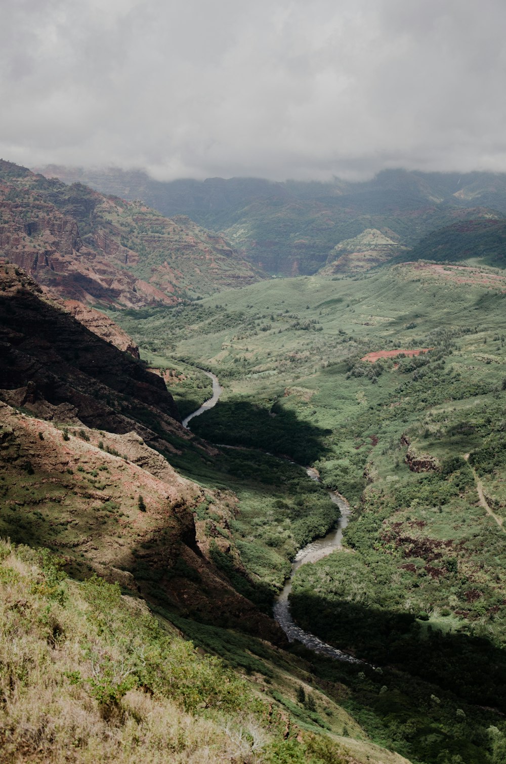 aerial view of green and brown mountains