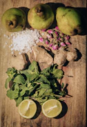 Minimalist flat lay of printed recipe PDFs with fresh ingredients around