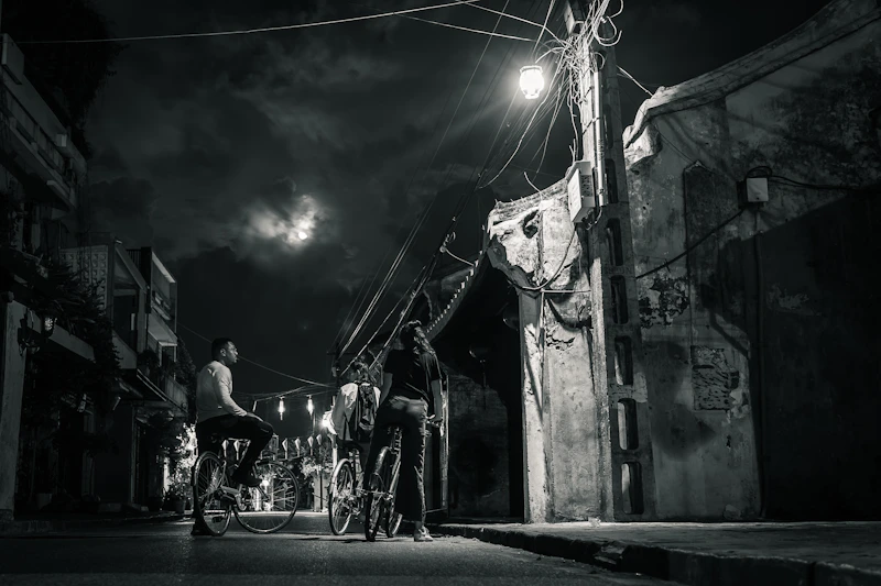 People walking on street during night time