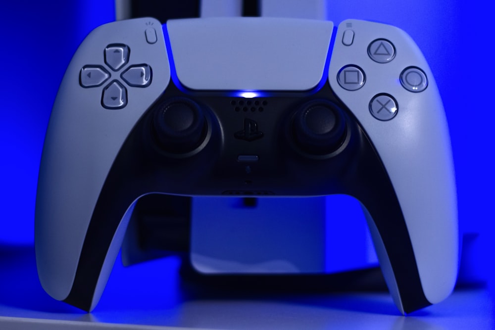blue and black game controller
