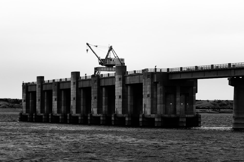 gray concrete building near body of water during daytime